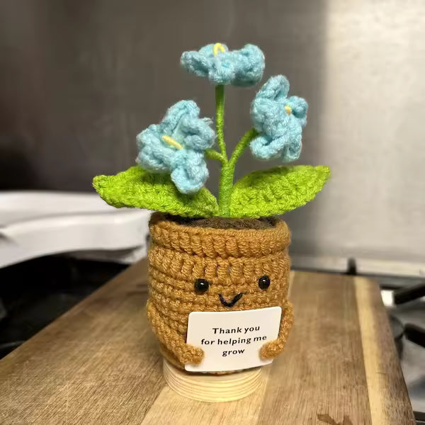 Brown crochet smiley pot with blue flowers, thank you for helping me grow card